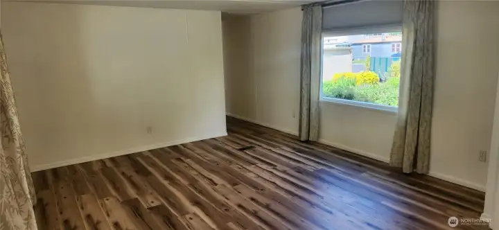 Spacious living room with views of your gardens. Spacious living room with views of your gardens.