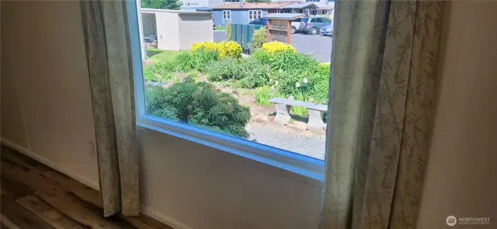 Another view of your stunning gardens, a private walkway and bench seating to sit and enjoy nature's beauty. Another view of your stunning gardens, a private walkway and bench seating to sit and enjoy nature's beauty.