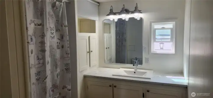 Updated bathroom with walk-in shower. Updated bathroom with walk-in shower.