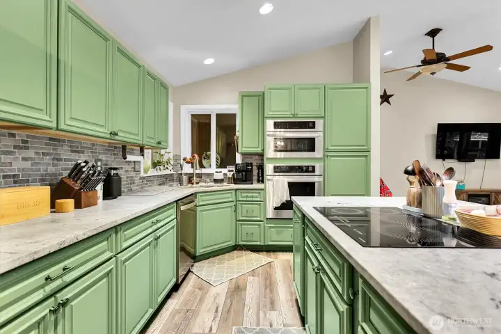 Another view of the kitchen with its large island. This house is perfect for entertaining!