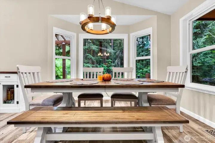Dining area with a bay window where you feel like you are outside. So peaceful and private.