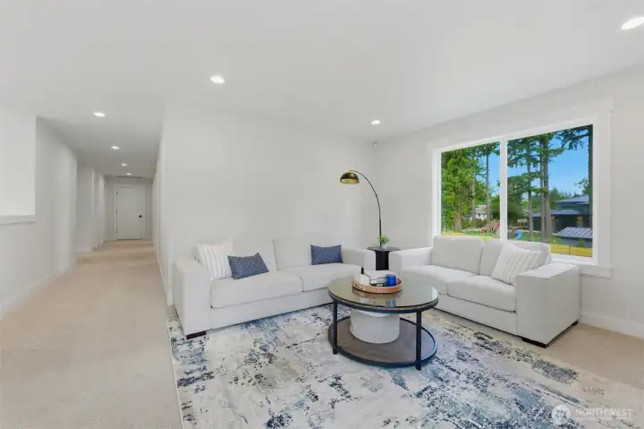 Spacious upstairs bonus loft with serene treetop views — flexible space for a media room, play area, or second living room. Spacious upstairs bonus loft with serene treetop views — flexible space for a media room, play area, or second living room.