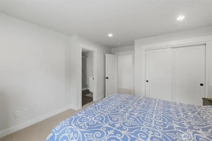 A second en suite bedroom with private bath access and a spacious closet — comfort and privacy on the upper level. A second en suite bedroom with private bath access and a spacious closet — comfort and privacy on the upper level.