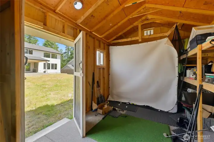 The backyard storage shed offers flexible bonus space — currently set up as a private golf simulator room, ready to be customized to fit your needs. The backyard storage shed offers flexible bonus space — currently set up as a private golf simulator room, ready to be customized to fit your needs.