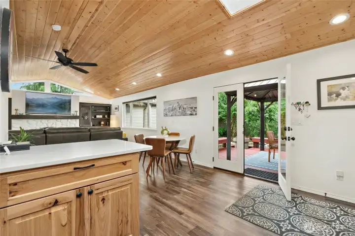 Step through the French doors to a private backyard retreat.
