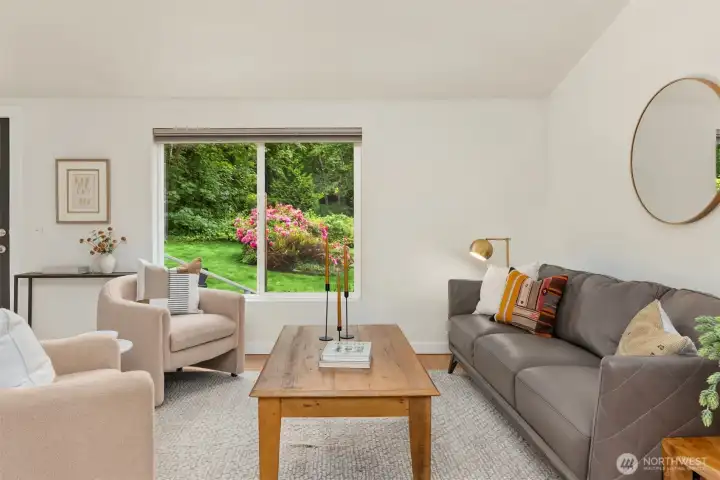 The gardens are front and center, bringing color and warmth to the living room. The gardens are front and center, bringing color and warmth to the living room.