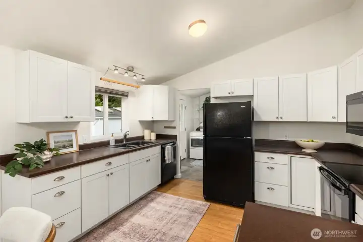 The kitchen has wood cabinets. The entire home enjoys efficient heating and cooling. The kitchen has wood cabinets. The entire home enjoys efficient heating and cooling.