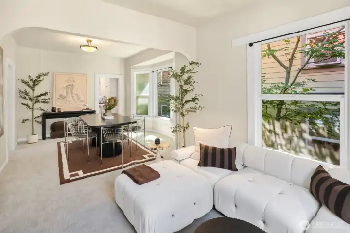 The open flow between the living and dining rooms makes everyday living—and entertaining—feel effortless.