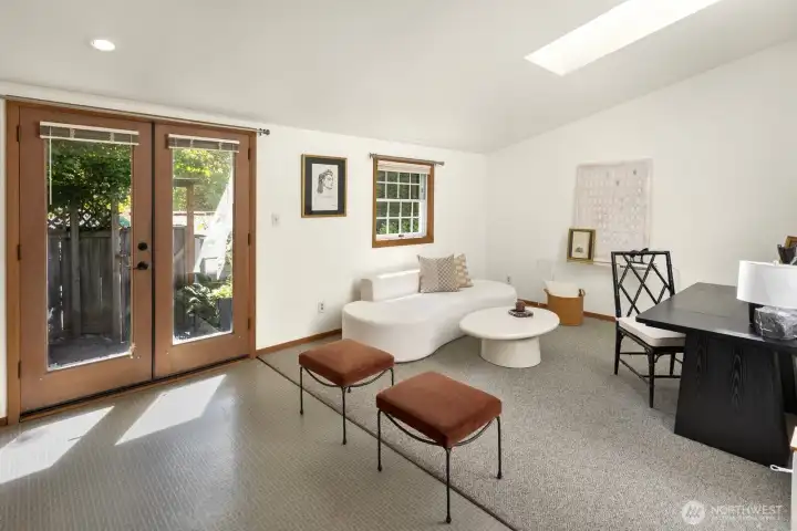 With abundant natural light (including skylight!) and direct access to the private back patio, this residence feels bright, comfortable, and independent.