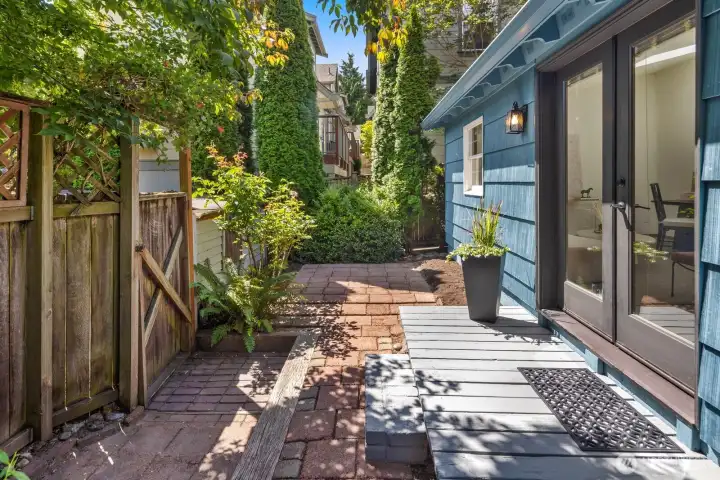 Extend your living space outdoors with a charming patio off the lower level's east-facing French doors.