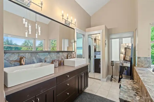 Generous double vanity, with tons of counter space.