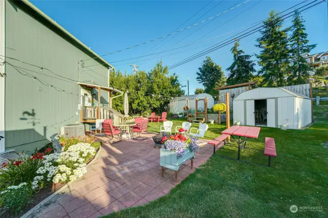 Enjoy outdoor living at its finest with garden space, outbuildings & many fun nooks & crannies to explore.