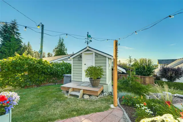 Enjoy outdoor living at its finest with garden space, outbuildings & many fun nooks & crannies to explore.