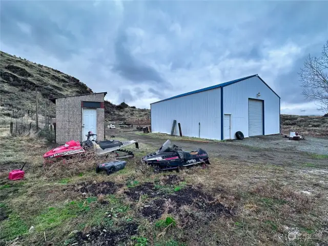 Outbuildings with fence enclosures