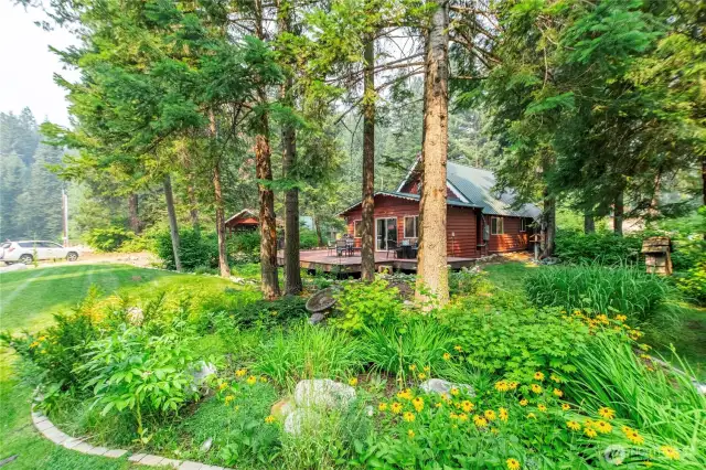 Mature Landscaping with Natural Foliage    Mature landscaping blends beautifully with the natural surroundings, creating a peaceful and serene atmosphere throughout the property.