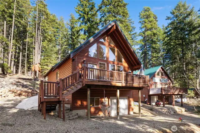 The quintessential cabin, nestled in the trees.