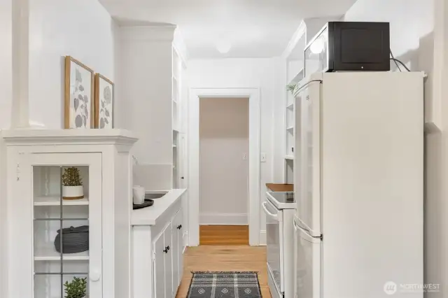 Leaded glass built-in, new counters, fanciful circular floor plan.