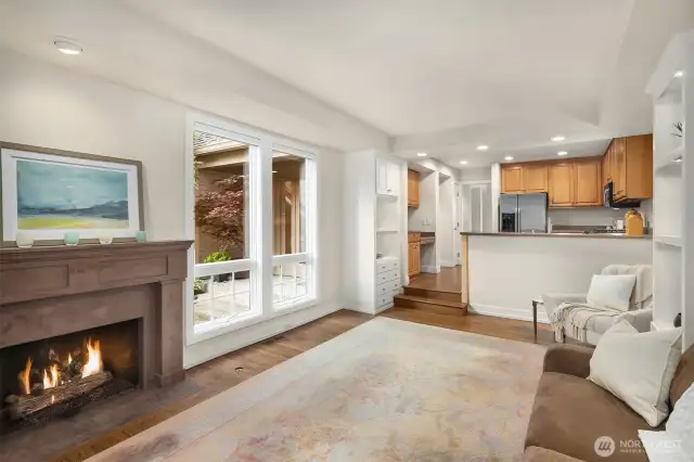 Ideal informal eating space for table and chairs where white chair is staged outside of kitchen.