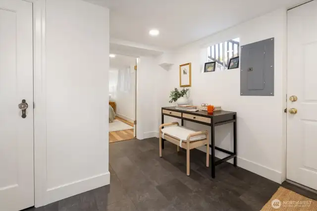 A separate entrance can be used, or the interior staircase, to access the refreshed lower level.