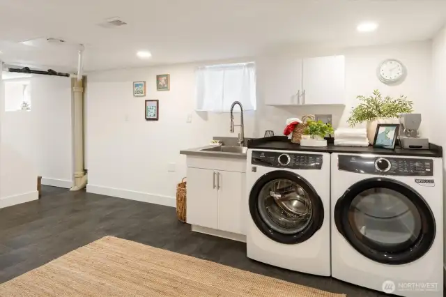 You’ll enjoy a new washer/dryer and folding shelf and a new utility sink in the laundry room.