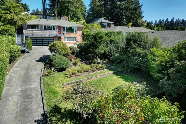 Driveway and front yard (grass has been digitally enhanced)
