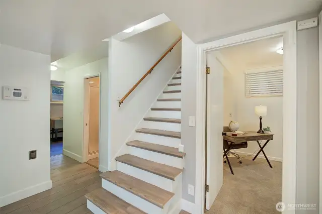 Stairs and hallway leading to main level