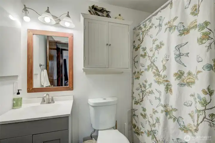 Bathroom has new vanity and flooring installed.