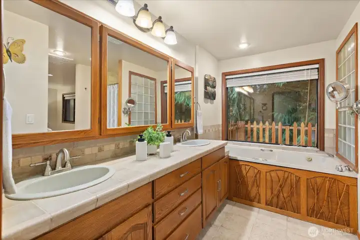 Double sinks with a generous sized vanity to store all your bathroom necessities.
