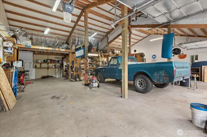 Detached garage with remarkable capacity, perfect for automotive enthusiasts or serious hobbyists. There's plenty of room for all your vehicles, toys, work trucks & more!