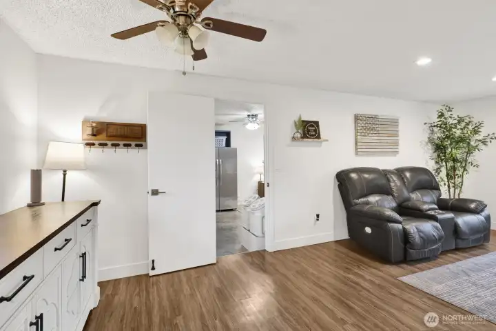 The dining room is open to the living room and leads to the kitchen