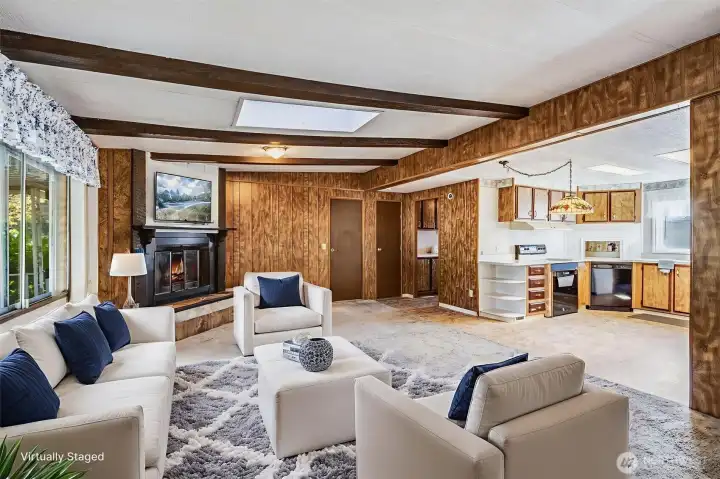 The living room shown here with virtual staging.