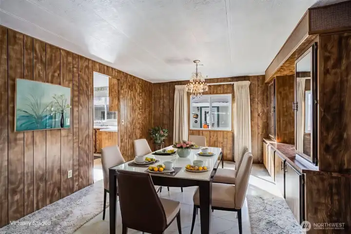 The dining room shown with virtual staging.