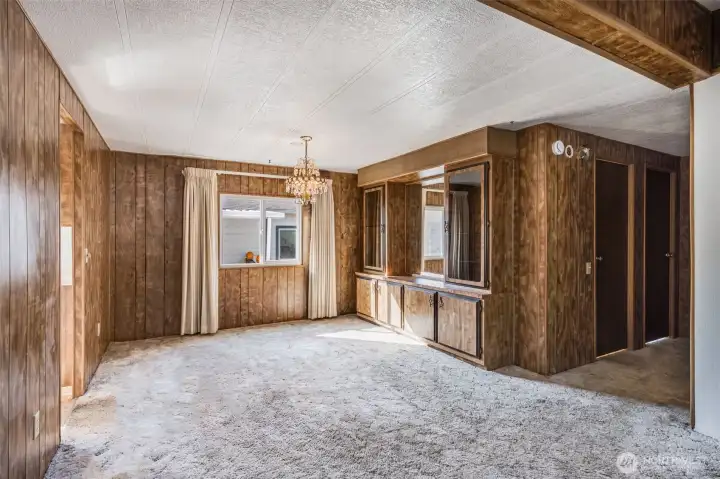 This enormous formal dining space includes a built in hutch for decorative storage!