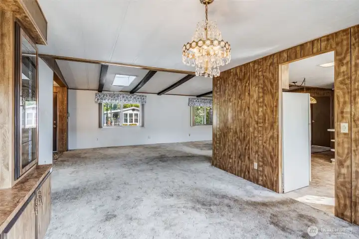 Another view of the living room showing it open to the main living room.
