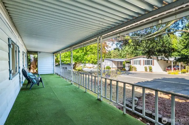 Out front, enjoy this expansive covered patio space.