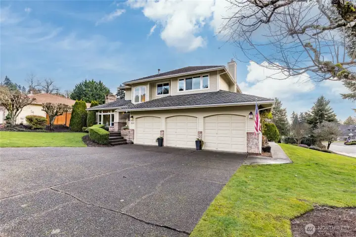 Attached 3-car garage and extended driveway provide plenty of parking space. Plenty of street parking for guests, too!