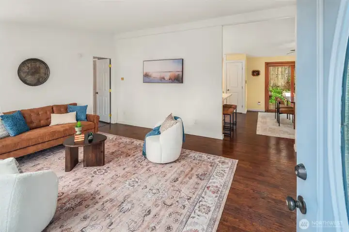 The living room is light and bright and spacious. Welcome in!