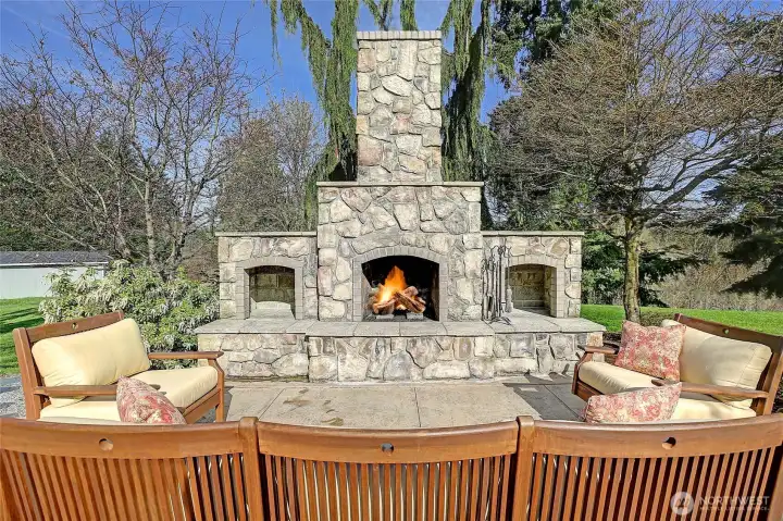 Relax on the back patio with a fire in this gorgeous stone fireplace.