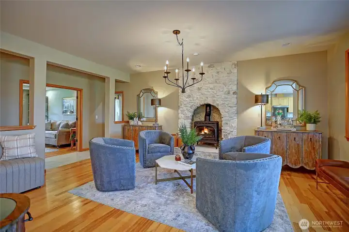 Adjacent to the kitchen and office/den.