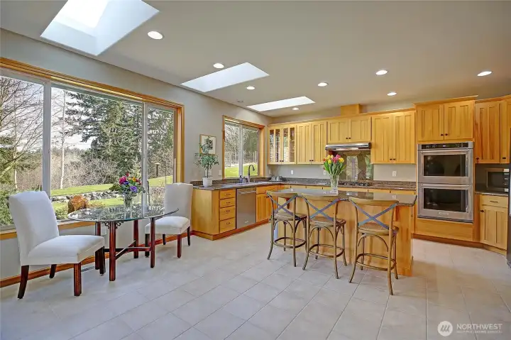 What amazing meals will you share in this large kitchen with eating area.  Stainless Steel appliances.