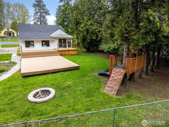 Backyard to Playground and Firepit