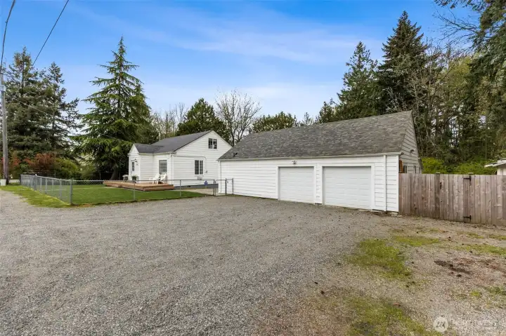 2 Car Garage with Additional Sheds in the Back for Storage