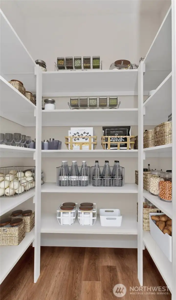 Virtually staged walk-in pantry to showcase functionality.