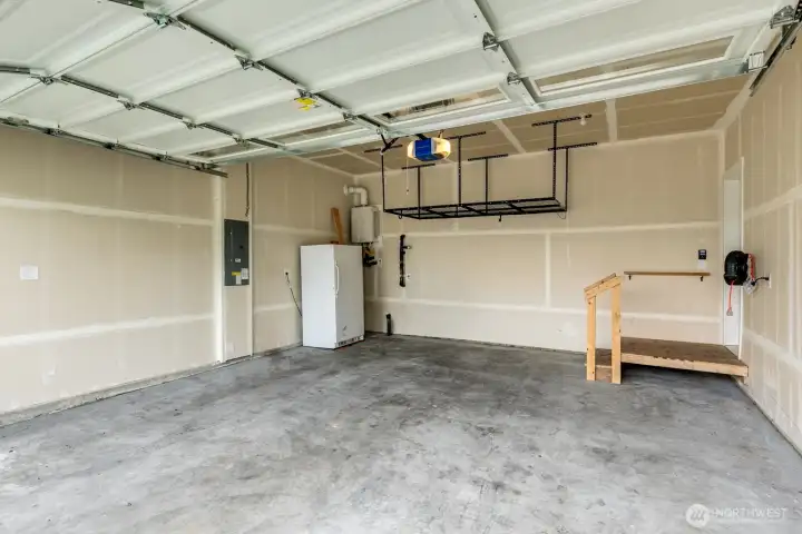 Double car garage with storage & fridge