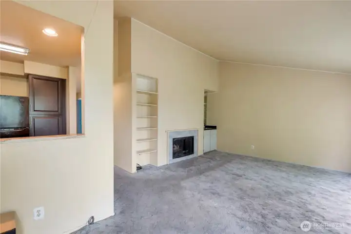 Cozy fireplace and wet bar. Cozy fireplace and wet bar.