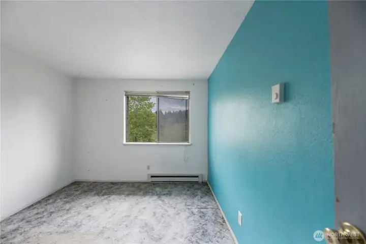 Spacious second bedroom for buyers looking to add personal style. Spacious second bedroom for buyers looking to add personal style.