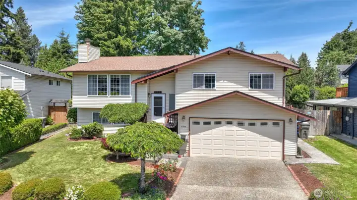 Welcome to this spacious Tiffany Park home tucked away on a quiet cul-de-sac.Attractive curb appeal with mature landscaping and a generous lot.