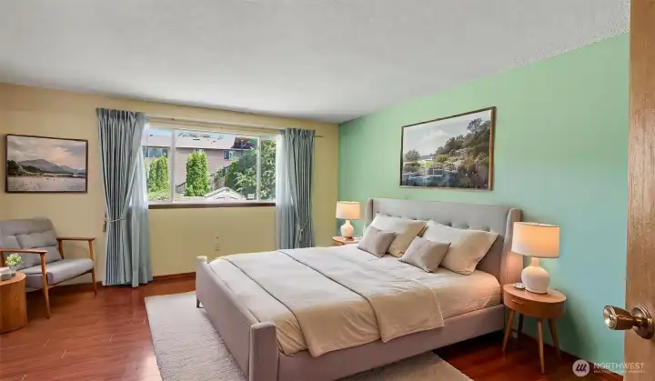 Primary suite offering comfort, privacy, and a private bath.