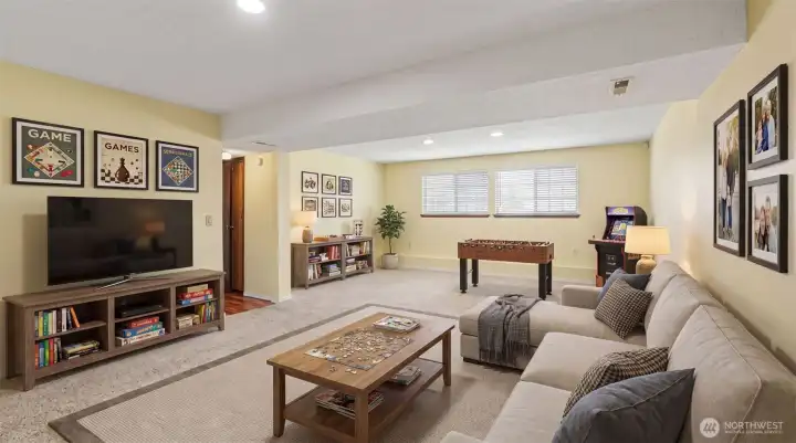 Expansive lower-level family room with endless possibilities.