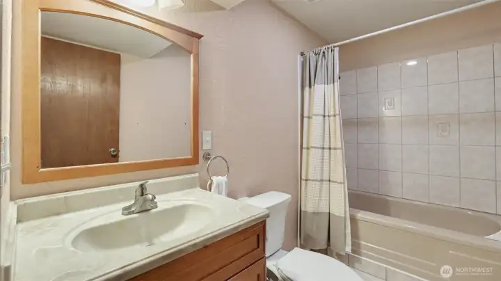 Convenient lower-level bathroom.